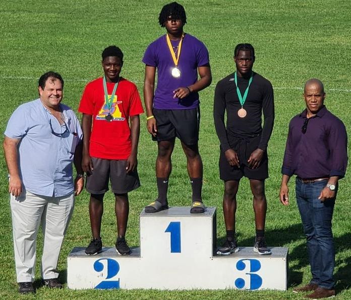 L-R: Cayman Islands Premier, Mr. Wayne Panton, Jhouri Ebanks, Kemole Deer, Jacob Kelly and President Lance Barnes