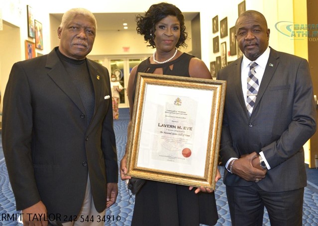 Hall of Fame Inductee, Laverne Eve, flanked by Mike Sands and Minister Bowleg