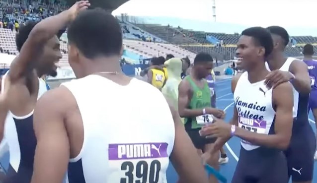 Vincentian athlete, Handal Roban (Left) celebrating with his teammates the new Relay record