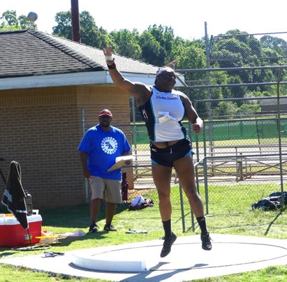 Maia Campbell in Shot Put action