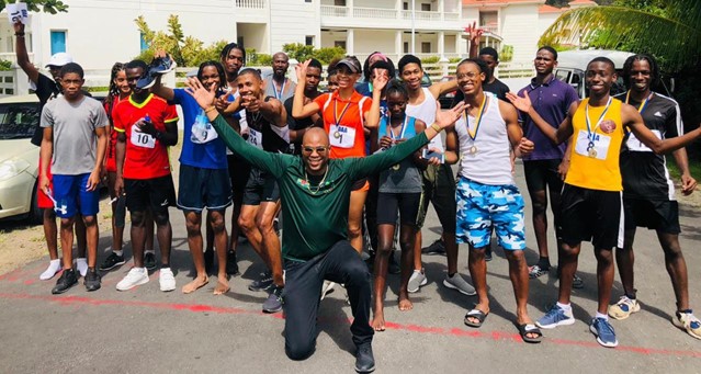 President, Brendan Williams, with the participants in the CARICOM 10K Qualifier